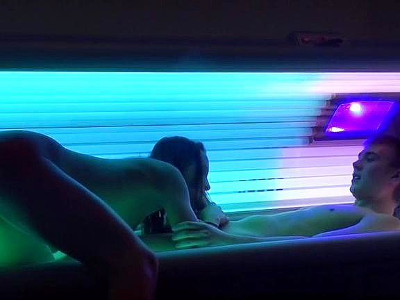Sex couple enjoying solarium